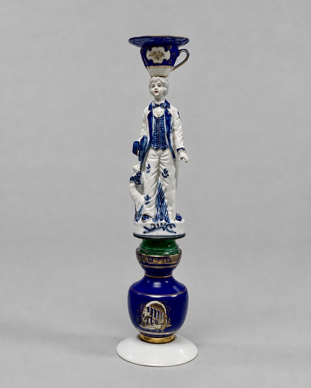 Blue and white porcelain figure in a tall assemblage
